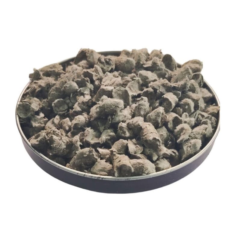 Granular lignin fiber for asphalt mixture and pavement stability