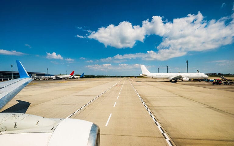 Asphalt additives and reinforcement materials for airport runways